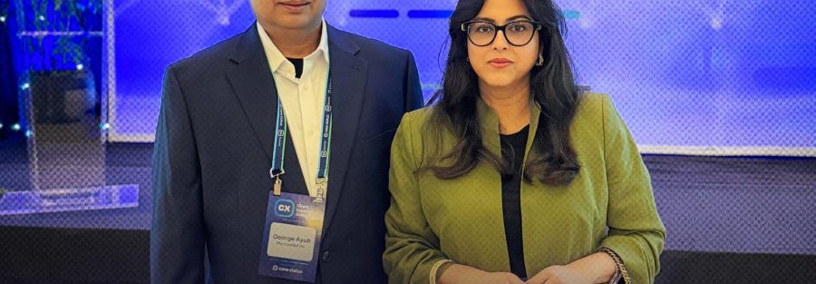 George Ayub and Dr. Soeta Islam with the CX Summit 2026 Platinum Sponsor banner