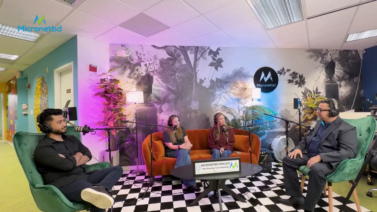 Andrea Telquist and Tara Haverkamp of Telaré Law on the sofa in the Micronetbd podcast studio in Hamilton, New Jersey, with George Ayub and Safayet Zamil of Micronetbd