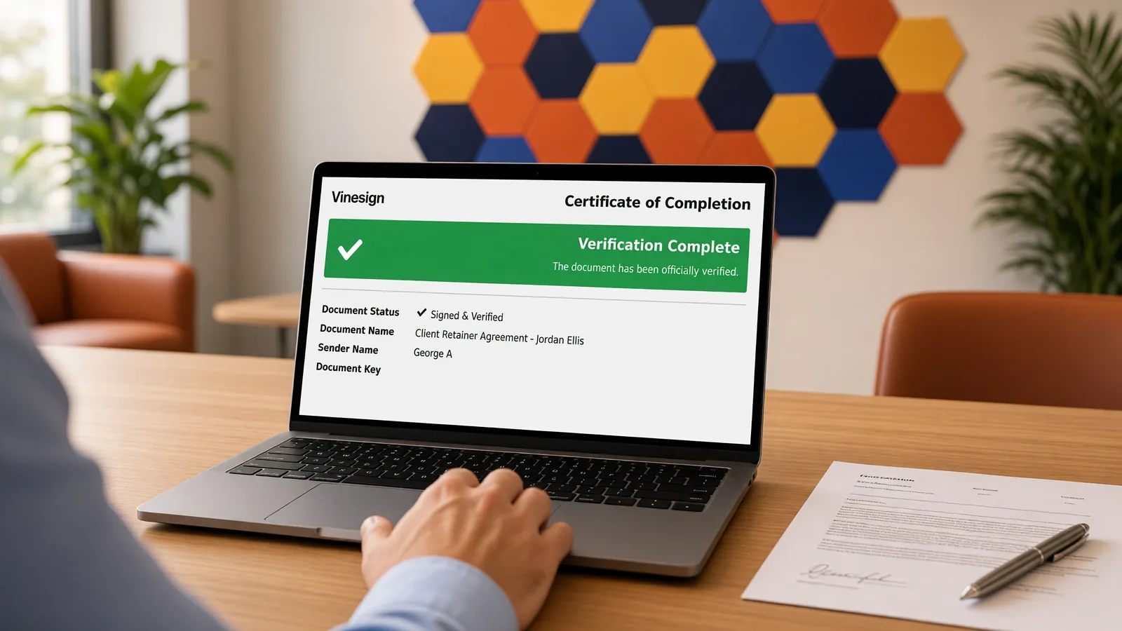 A laptop shows a Vinesign certificate of completion with Verification Complete beside a signed agreement