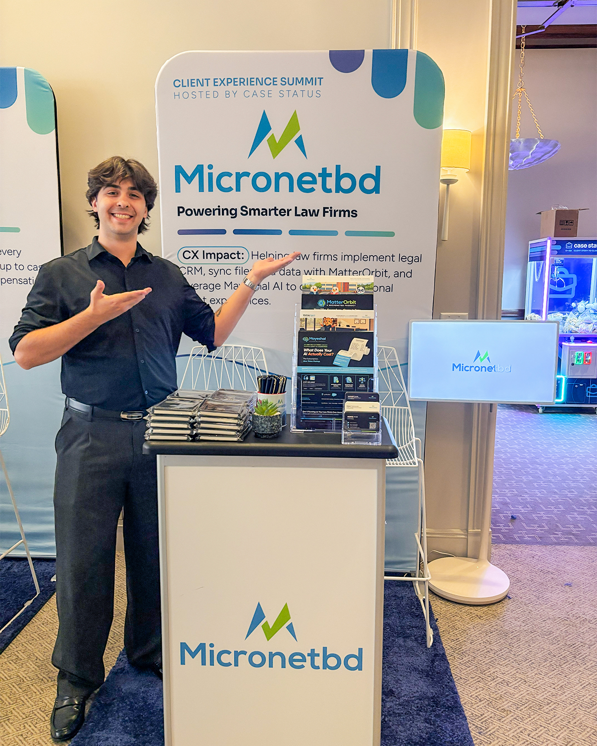 A Micronetbd team member at Booth 11, CX Summit 2026